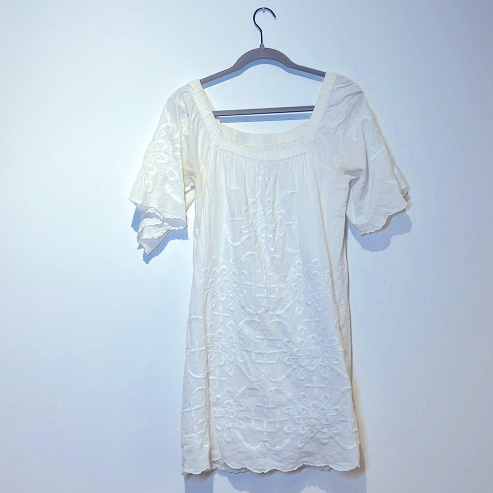 White stitched bohemian dress.